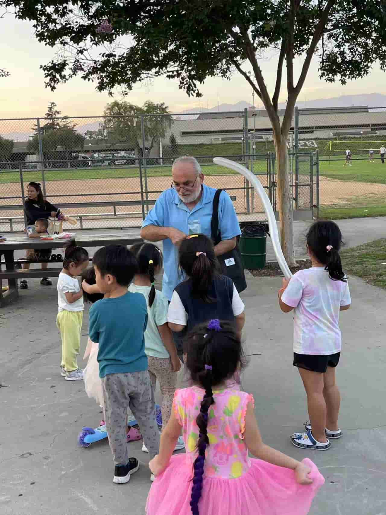 Grandpa blowing balloon